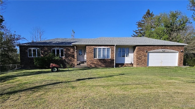 3159 Upper Mountain Rd, Cambria, NY 14132 - single story home with an attached garage, a front lawn, and brick siding