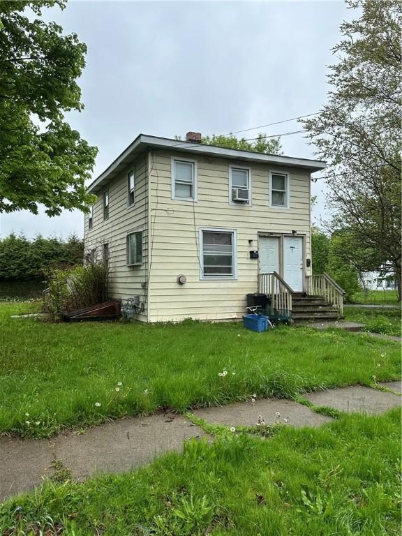 312 Broadway St, Elmira-City, NY 14904 - view of front of house featuring a chimney and cooling unit