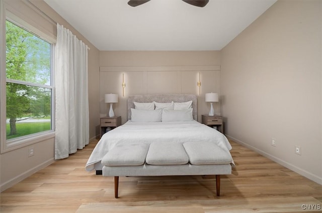 161 Knapps Knolle Rd, Schuyler, NY 13502 - bedroom featuring baseboards, multiple windows, and light wood finished floors