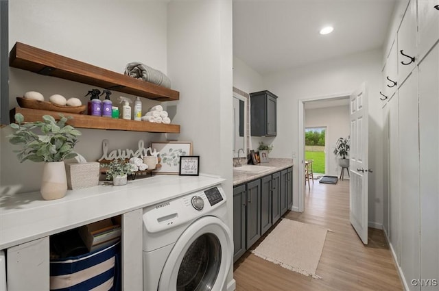 161 Knapps Knolle Rd, Schuyler, NY 13502 - clothes washing area with washer / dryer, light wood-style floors, cabinet space, recessed lighting, and baseboards