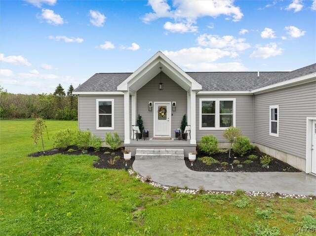 161 Knapps Knolle Rd, Schuyler, NY 13502 - view of front of property featuring a front lawn, covered porch, and roof with shingles