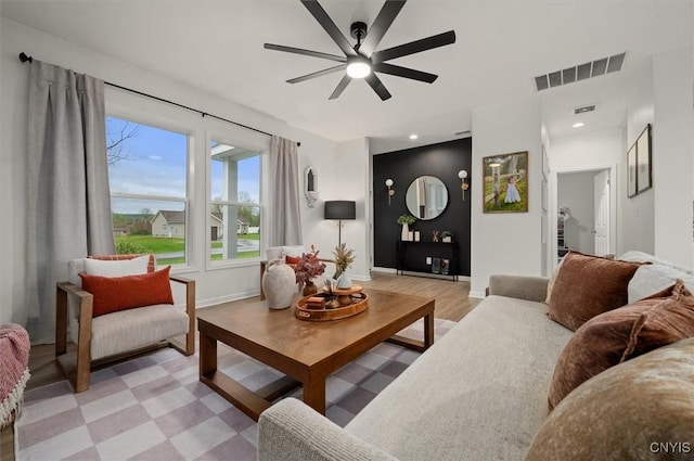 161 Knapps Knolle Rd, Schuyler, NY 13502 - living room with ceiling fan, baseboards, and light wood-style flooring