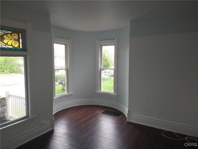 406 Milton Ave, Syracuse, NY 13204 - spare room featuring dark wood-style floors and baseboards