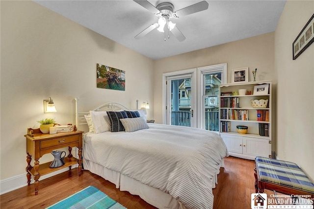14 S Lake Dr Unit 2B, Chautauqua, NY 14722 - bedroom with wood finished floors, access to exterior, a ceiling fan, and baseboards