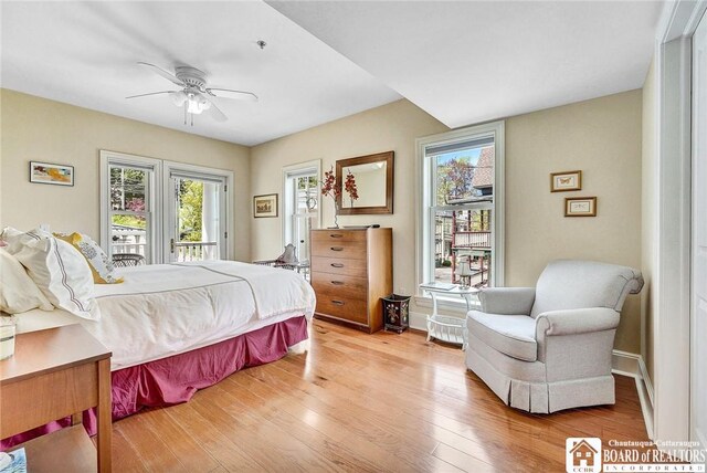 14 S Lake Dr Unit 2B, Chautauqua, NY 14722 - bedroom with access to exterior and light wood-style flooring