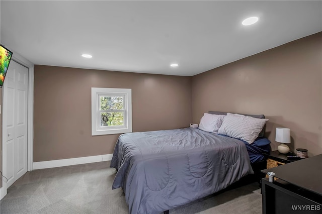 bedroom with carpet, baseboards, and recessed lighting