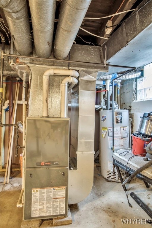 utilities with gas water heater and heating unit