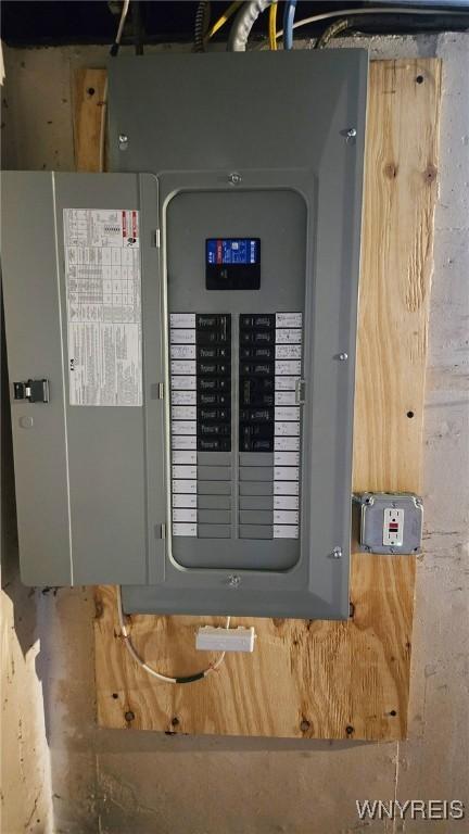 585 Downing St, Buffalo, NY 14220 - utility room featuring electric panel