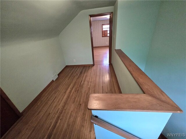 585 Downing St, Buffalo, NY 14220 - corridor with wood finished floors and vaulted ceiling