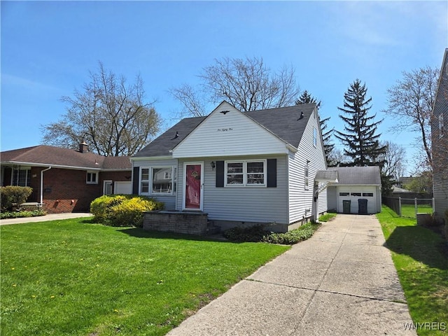 585 Downing St, Buffalo, NY 14220 - bungalow-style house featuring an outbuilding, a garage, and driveway