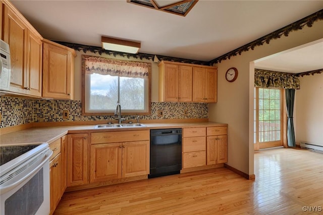 43 County Rte 9, Rossie, NY 13642 - kitchen featuring white appliances, a sink, backsplash, light wood-type flooring, and light countertops
