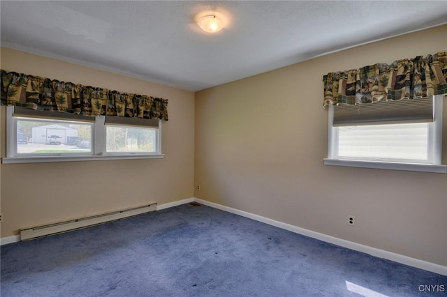 43 County Rte 9, Rossie, NY 13642 - unfurnished room with a baseboard radiator, carpet flooring, plenty of natural light, and baseboards