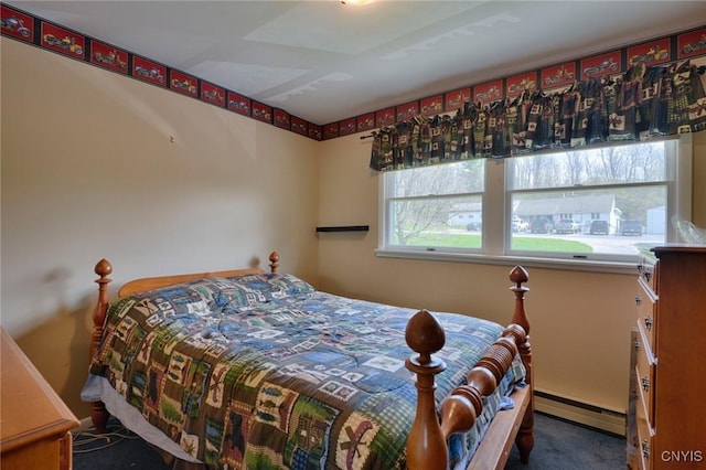 43 County Rte 9, Rossie, NY 13642 - bedroom featuring baseboard heating and carpet flooring