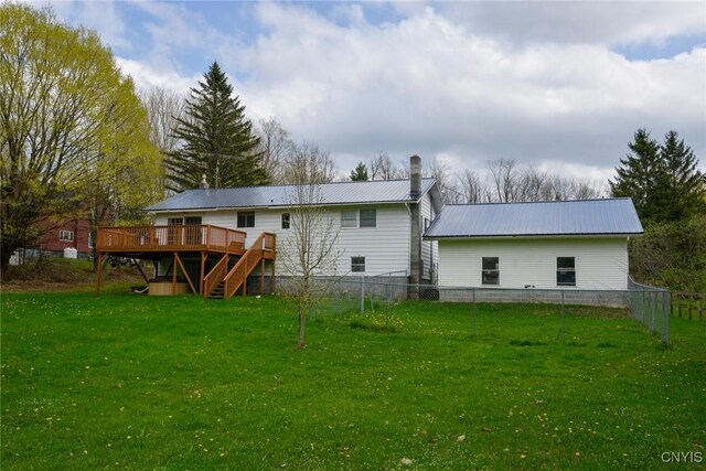 43 County Rte 9, Rossie, NY 13642 - rear view of property with stairs, a wooden deck, metal roof, and a chimney