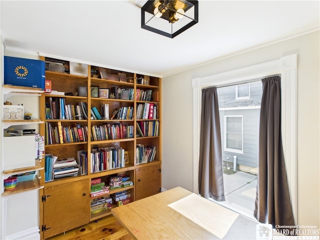 bedroom with ornamental molding