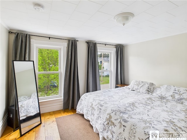 bedroom with light wood-style flooring