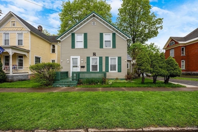 view of front of house featuring a front lawn