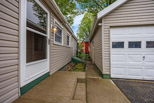 view of property exterior with a garage