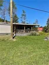 1984-2008 S Genesee St, Montour, NY 14865 - view of green lawn with a wooden deck