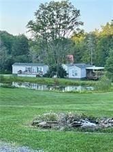 1984-2008 S Genesee St, Montour, NY 14865 - view of green lawn featuring a water view and a wooded view