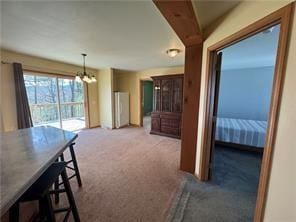 1984-2008 S Genesee St, Montour, NY 14865 - dining space featuring carpet and a chandelier