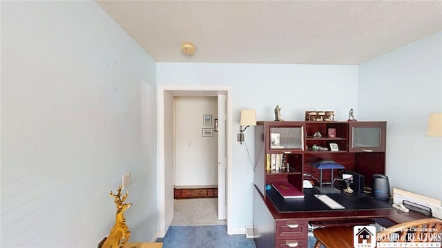 view of carpeted office space
