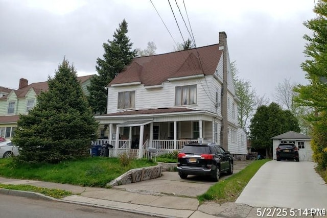 636 Park Ave, Syracuse, NY 13204 - view of front of house featuring covered porch, an outbuilding, and a chimney