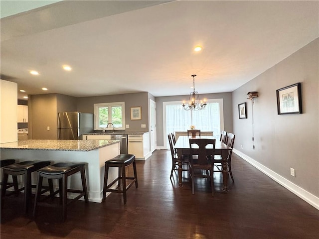 5 Walnut Street Ext, Sennett, NY 13021 - dining room with baseboards, a chandelier, recessed lighting, dark wood-style floors, and washer / clothes dryer