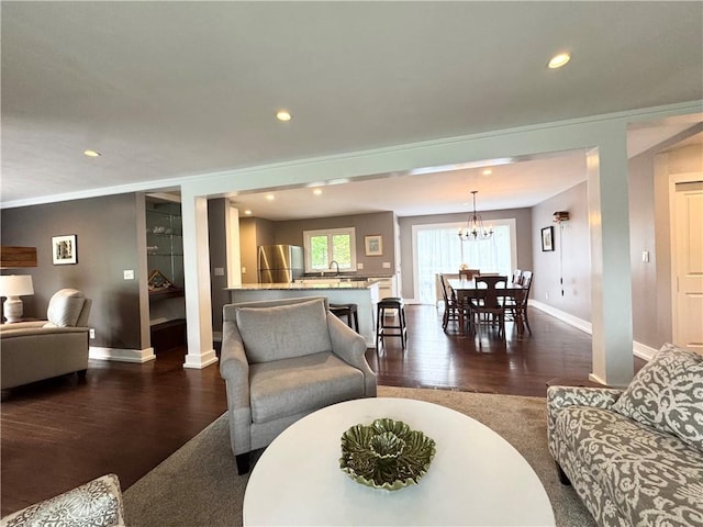 5 Walnut Street Ext, Sennett, NY 13021 - living room with dark wood-type flooring, baseboards, recessed lighting, and a chandelier