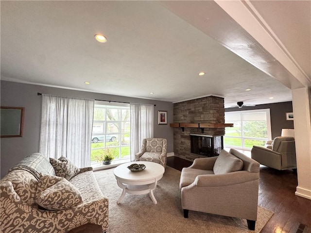 5 Walnut Street Ext, Sennett, NY 13021 - living room with a fireplace, healthy amount of natural light, wood finished floors, recessed lighting, and baseboards