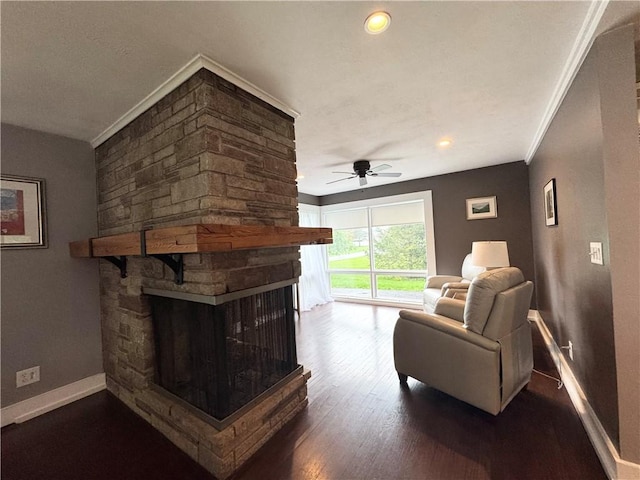 5 Walnut Street Ext, Sennett, NY 13021 - living room with a fireplace, ceiling fan, ornamental molding, baseboards, and dark wood-style floors