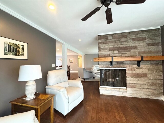 5 Walnut Street Ext, Sennett, NY 13021 - living room featuring ceiling fan, a fireplace, wood finished floors, crown molding, and baseboards