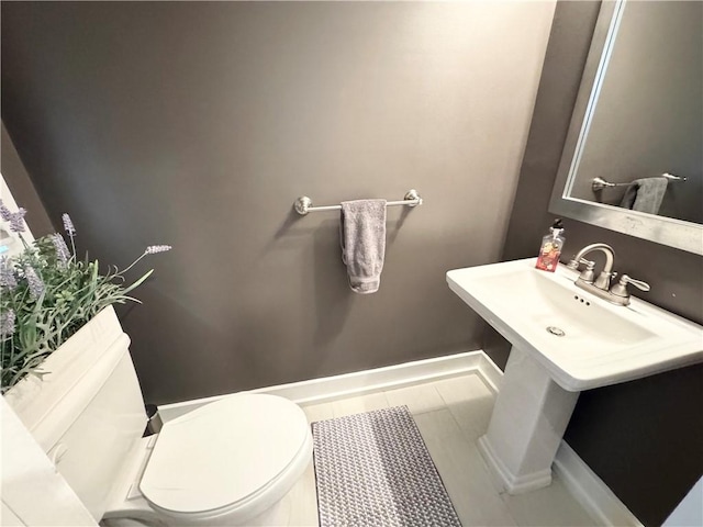 5 Walnut Street Ext, Sennett, NY 13021 - half bath with toilet, baseboards, and tile patterned flooring