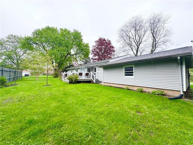 5 Walnut Street Ext, Sennett, NY 13021 - rear view of house featuring a lawn and a wooden deck
