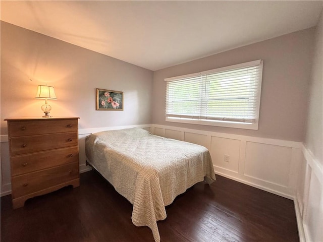 5 Walnut Street Ext, Sennett, NY 13021 - bedroom featuring dark wood-style flooring, vaulted ceiling, and a wainscoted wall