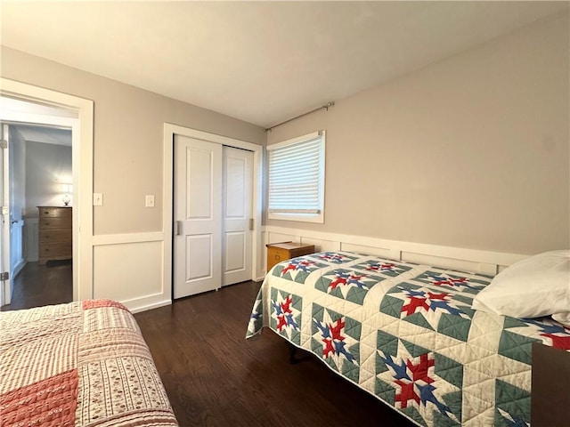 5 Walnut Street Ext, Sennett, NY 13021 - bedroom featuring dark wood-style floors, a closet, and a wainscoted wall