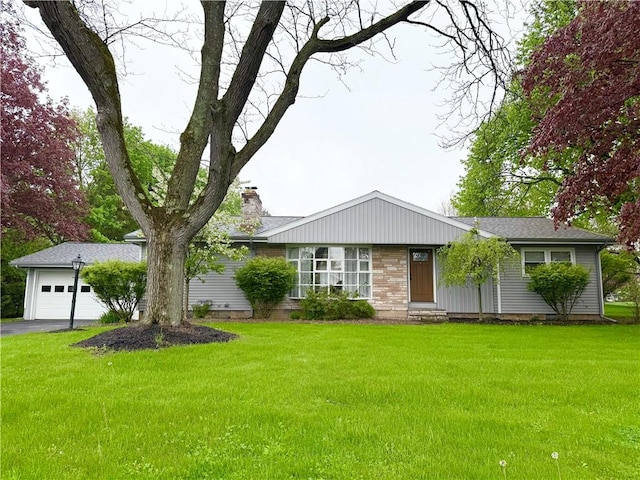 5 Walnut Street Ext, Sennett, NY 13021 - ranch-style home with a front lawn, a chimney, and asphalt driveway