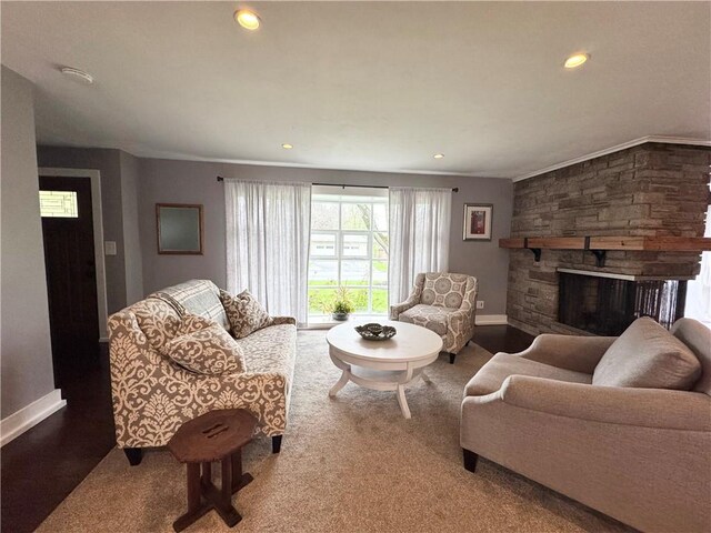 5 Walnut Street Ext, Sennett, NY 13021 - living area with baseboards, recessed lighting, a fireplace, and crown molding