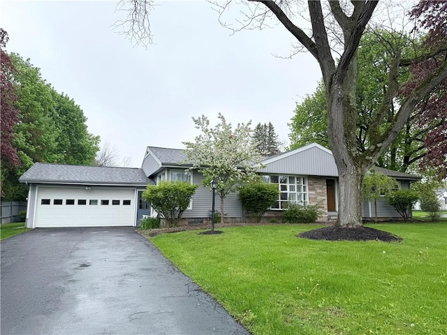 5 Walnut Street Ext, Sennett, NY 13021 - single story home with asphalt driveway, a garage, and a front yard
