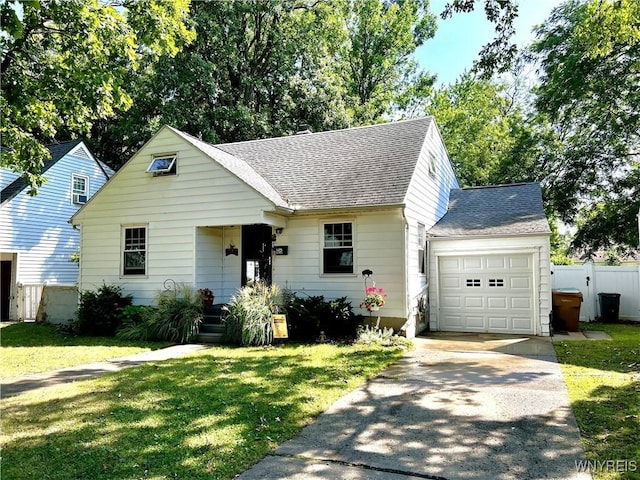 65 Woodridge Ave, Cheektowaga, NY 14225 - view of front of house with roof with shingles, asphalt driveway, and an attached garage
