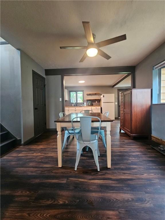 57 Interstate Pkwy, Bradford-City, PA 16701 - dining space with dark wood-type flooring, ceiling fan, and baseboards