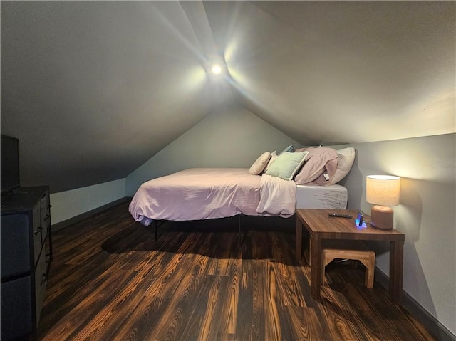 57 Interstate Pkwy, Bradford-City, PA 16701 - bedroom with wood finished floors, vaulted ceiling, and baseboards