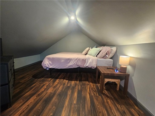 57 Interstate Pkwy, Bradford-City, PA 16701 - bedroom featuring wood finished floors, vaulted ceiling, and baseboards