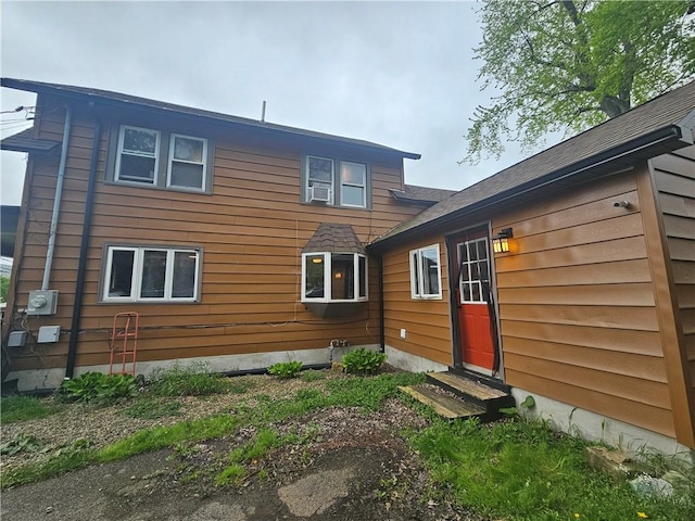 57 Interstate Pkwy, Bradford-City, PA 16701 - back of property with entry steps and cooling unit