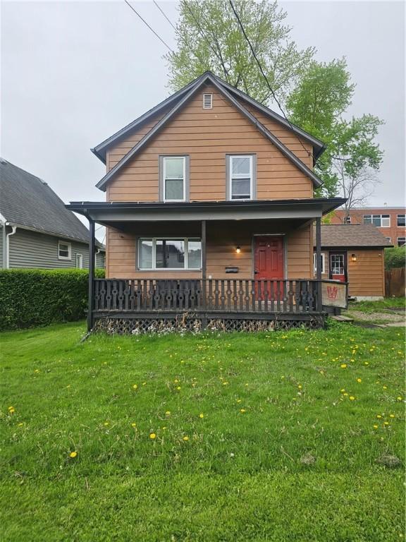 57 Interstate Pkwy, Bradford-City, PA 16701 - rear view of house featuring a porch and a yard
