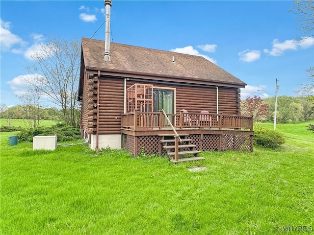 2669 Town Line Rd, Mount Morris, NY 14517 - back of house with log siding, a wooden deck, a yard, and roof with shingles