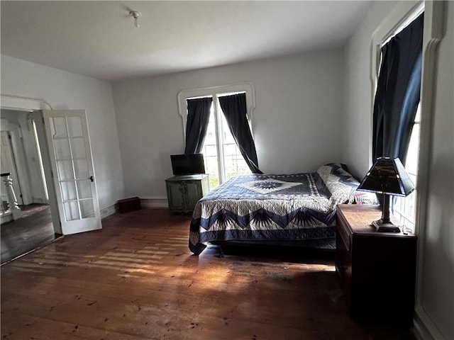 93 Main St, Laurens, NY 13796 - bedroom with hardwood / wood-style flooring and baseboards