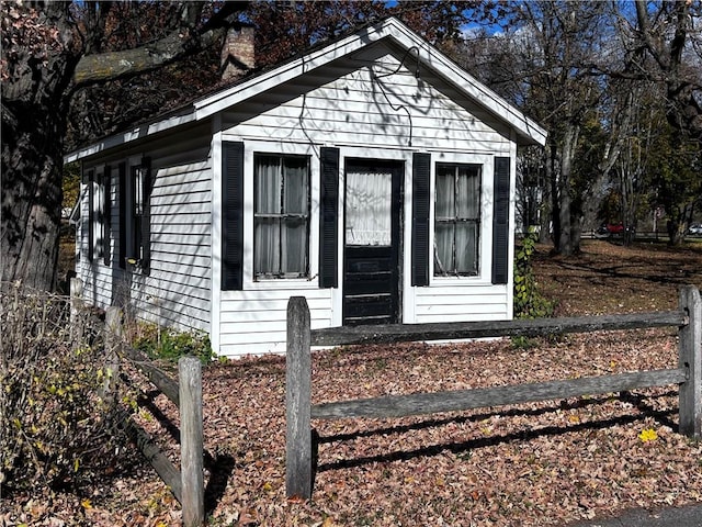 93 Main St, Laurens, NY 13796 - view of side of home featuring a chimney and fence