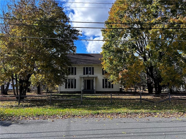 93 Main St, Laurens, NY 13796 - obstructed view of property with a fenced front yard