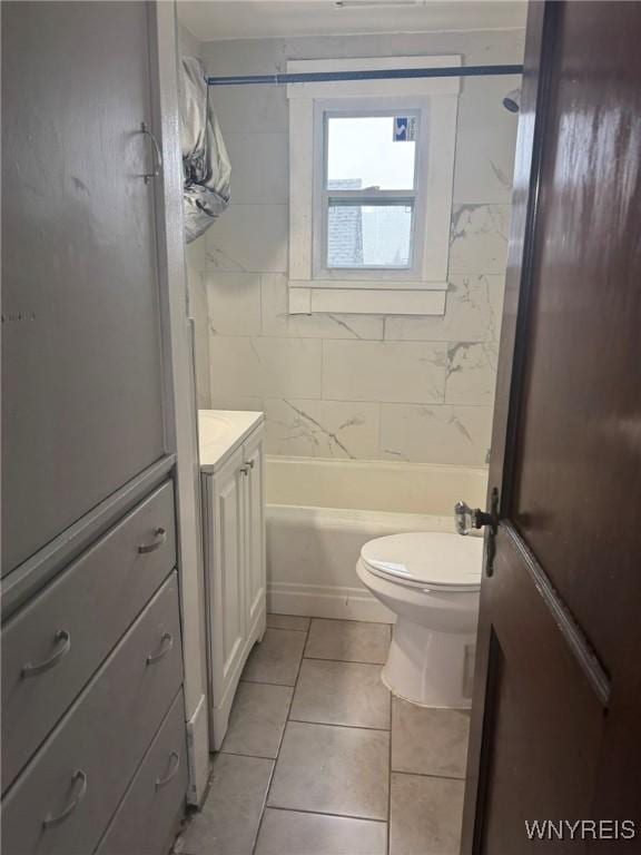 231 Grider St, Buffalo, NY 14215 - bathroom featuring tile patterned flooring, toilet, vanity, and shower / bathtub combination